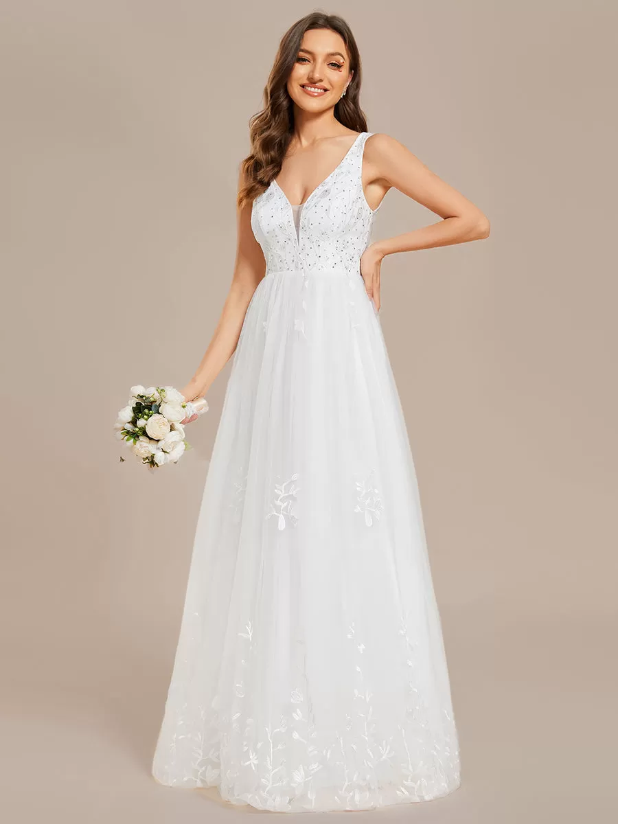 Robe de mariée trapèze brodée sans manches à col en V