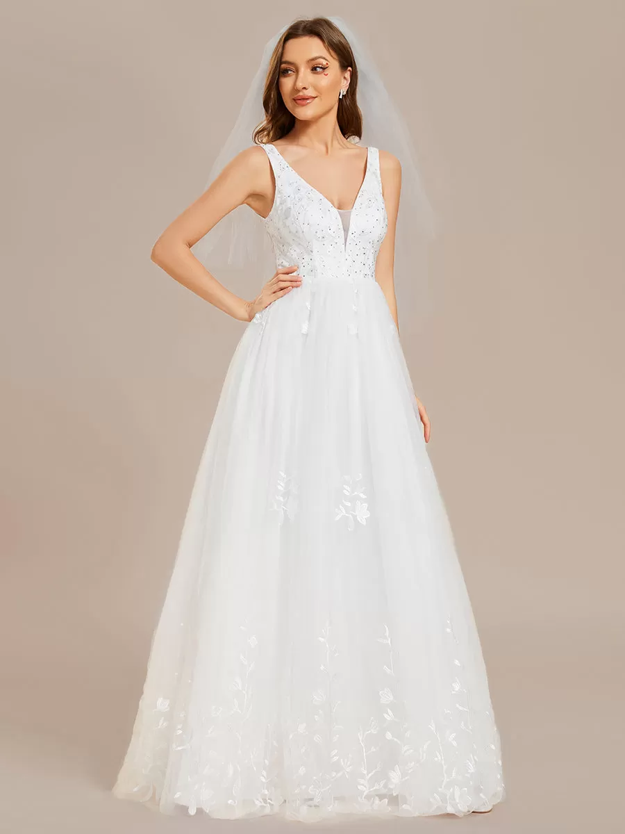 Robe de mariée trapèze brodée sans manches à col en V